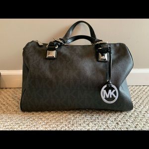 Michael Kors black monogram speedy bag.